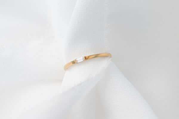 Bague en or jaune diamant baguette