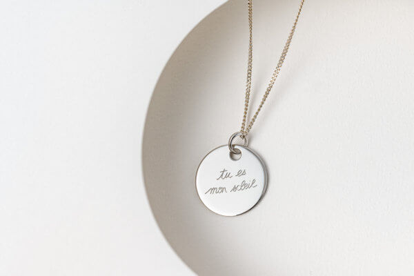 Medaille argent soleil